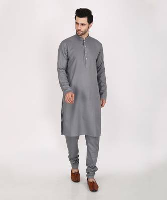 Featuring Multicolor block printed hand embroidered Nehru Jacket with kurta & Churidaar. 1