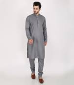 Featuring Multicolor block printed hand embroidered Nehru Jacket with kurta & Churidaar.