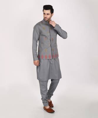 Featuring Multicolor block printed hand embroidered Nehru Jacket with kurta & Churidaar. 2