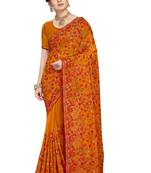 Mustard embroidered georgette saree with blouse