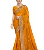 Mustard embroidered georgette saree with blouse