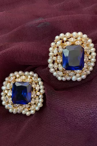 Blue Emerald Cut Blue Sapphire Stud With Diamonds And Cultured Pearl Halo In 18K Gold Polish