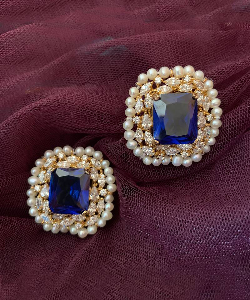 Blue Emerald Cut Blue Sapphire Stud With Diamonds And Cultured Pearl Halo In 18K Gold Polish