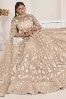 Beige embroidered net semi stitched lehenga