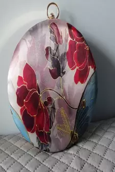 GOLD WITH MULTI COLOR  HAND EMBROIDED BEADED ROUND CLUTCH CUM SLING BAG(size : 8inch L X 8inch W)
