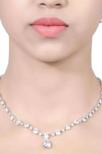 White Solitaire Necklace With Pear Drop Pendant And Earrings