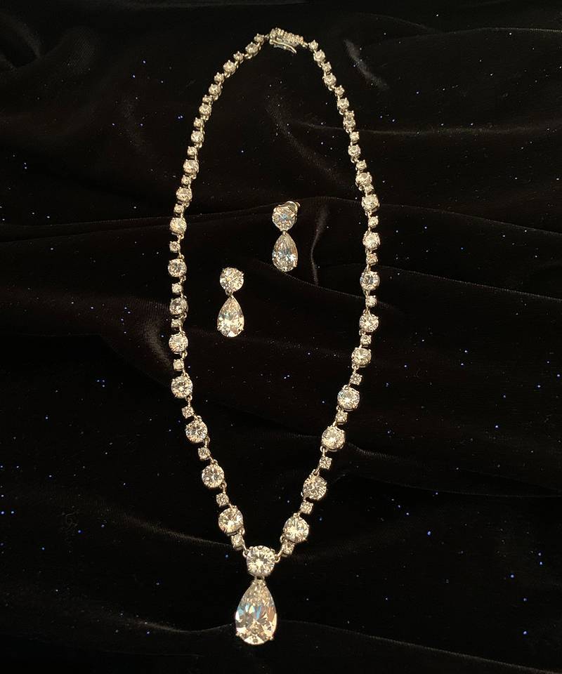 White Solitaire Necklace With Pear Drop Pendant And Earrings