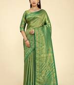 Green woven silk saree with blouse