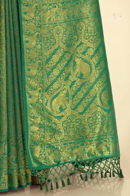 Green woven silk saree with blouse 5