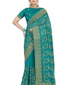 Green embroidered georgette saree with blouse