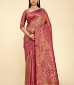 Pink woven silk saree with blouse