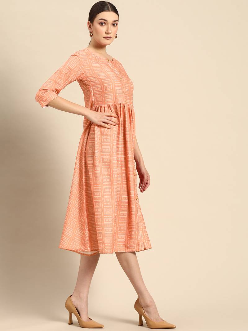 Women's Peach Printed Poly Rayon A-line Dress.