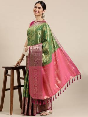Green woven silk blend saree with blouse 1