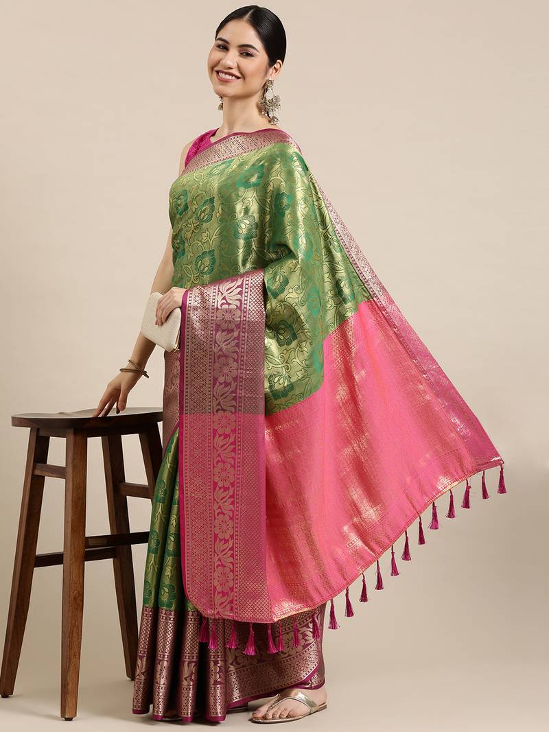 Green woven silk saree with blouse