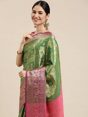 Green woven silk blend saree with blouse 2