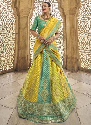 Yellow Jacquard Embroidered Bridal Lehengas 1