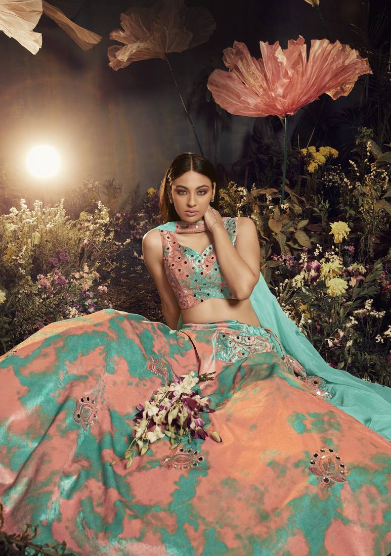 TURQUOISE ORANGE SIBURRI PRINT WITH SEQUINS EMBROIDERED AND MIRROR WORK VELVET FESTIVE & PARTY WEAR LEHENGA