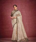 Heavy Beige Saree In Patterned Organza Fabric With Stripe Printed And Embroidered Border And Heavy Embroiderey Work