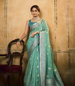 Light blue woven tissue saree with blouse