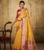 Yellow woven tissue saree with blouse