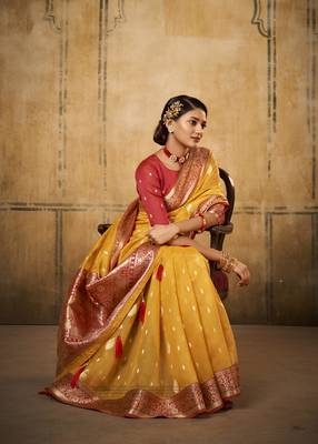 Yellow woven tissue saree with blouse 3