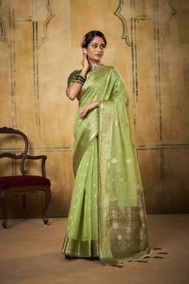 Light green woven tissue saree with blouse 1
