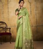 Light green woven tissue saree with blouse