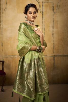 Light green woven tissue saree with blouse 2