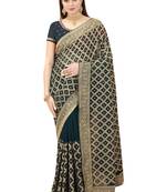 Teal embroidered georgette saree with blouse