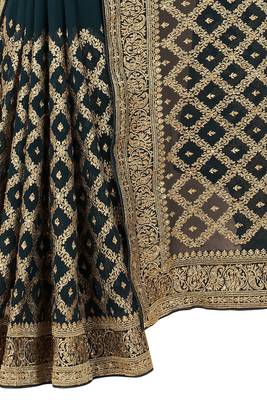 Teal embroidered georgette saree with blouse 3