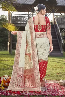 Cream and Red Banarasi silk blend Zari Woven Saree with Sequined Blouse