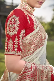 Cream and Red Banarasi silk blend Zari Woven Saree with Sequined Blouse