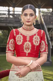 Cream and Red Banarasi silk blend Zari Woven Saree with Sequined Blouse