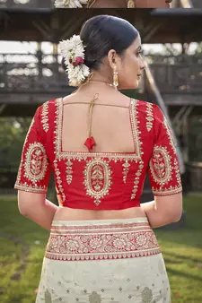 Cream and Red Banarasi silk blend Zari Woven Saree with Sequined Blouse