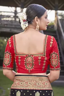 Black woven Banarasi silk blend saree with blouse
