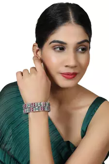 Styylo Fashion Set of 2 Silver Oxidised Curved Designed Red and Green Stone Studded Bangles