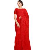 Red embroidered net saree with blouse