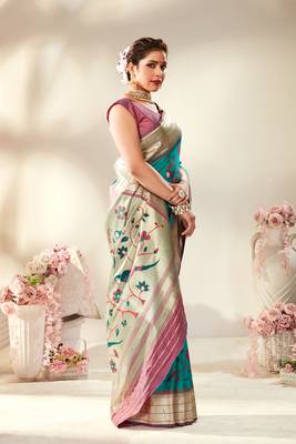 Turquoise woven silk saree with blouse 1
