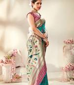 Turquoise woven silk saree with blouse