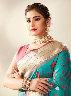 Turquoise woven silk saree with blouse 2
