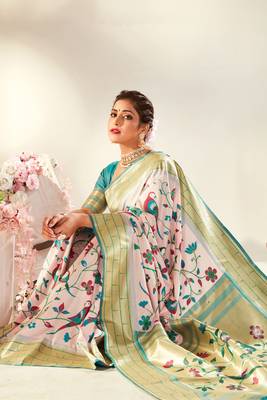 Light pink woven silk saree with blouse 2