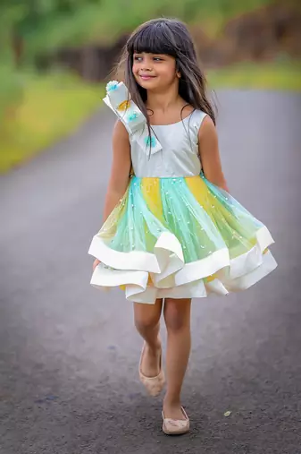 Big Stylish Bow with pleated embroidered Frock