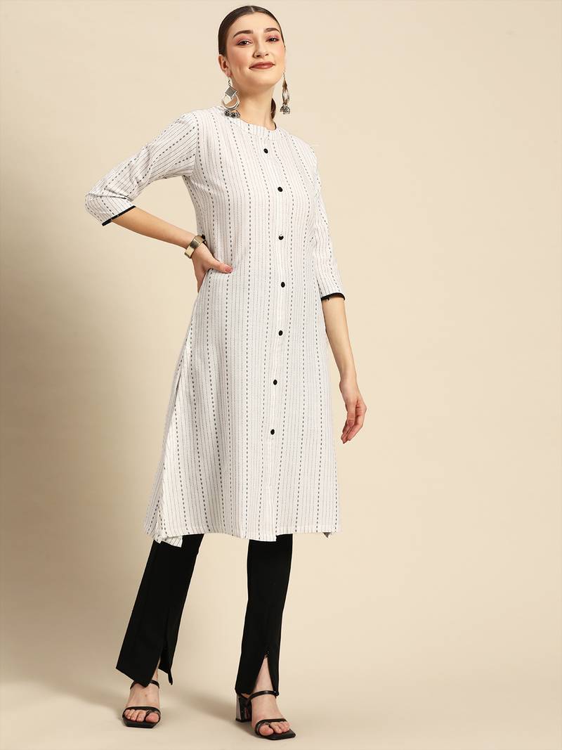 Mohvogue Women's White Woven Design Cotton Blend Kurta.