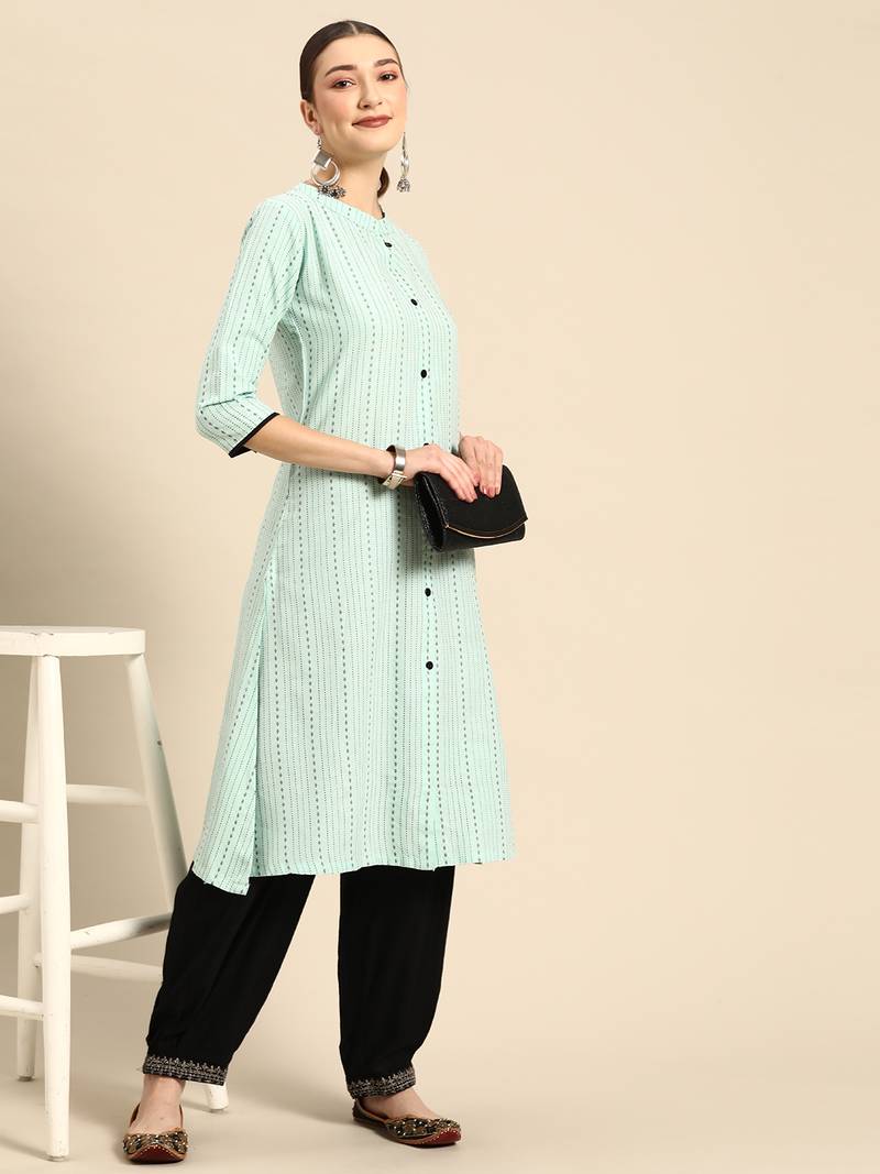 Mohvogue Women's Green Woven Design Cotton Blend Kurta.