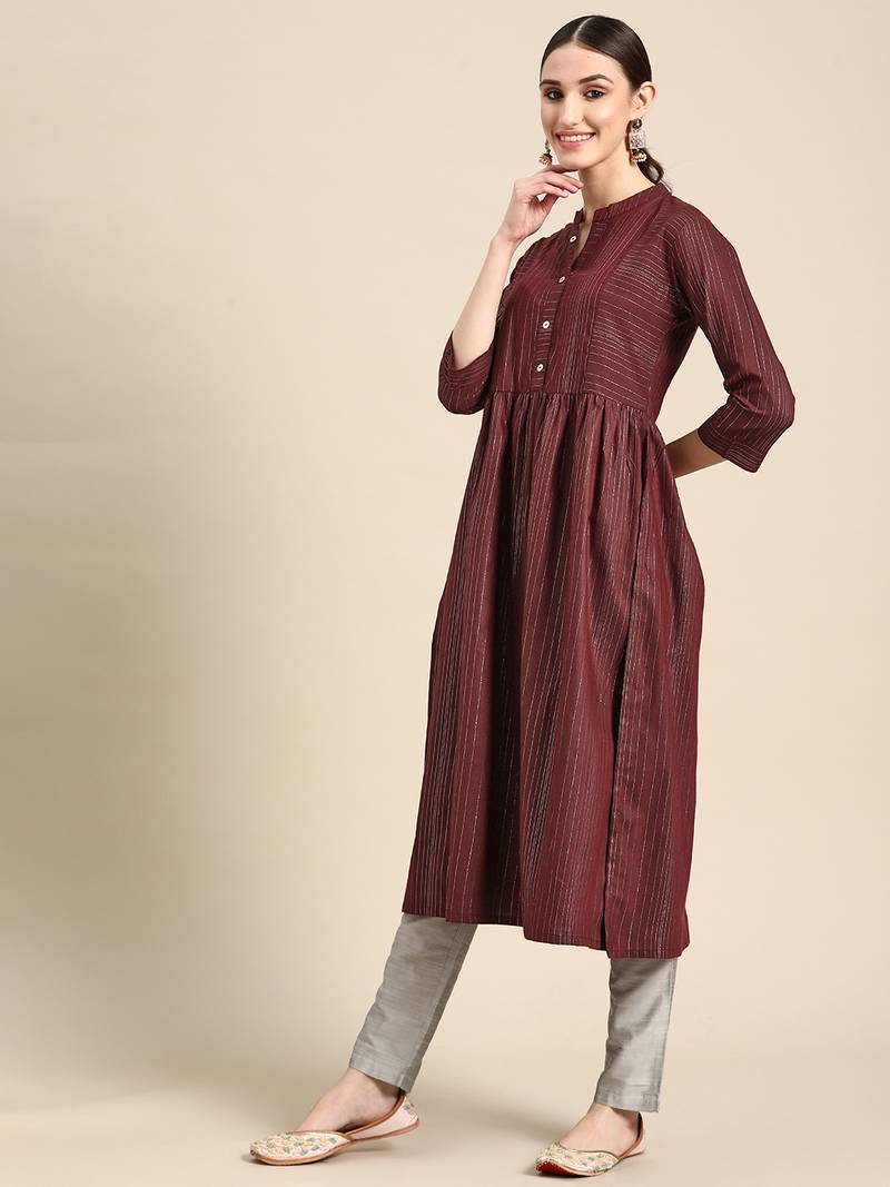 Mohvogue Women's Maroon Woven Design Cotton Blend Kurta.