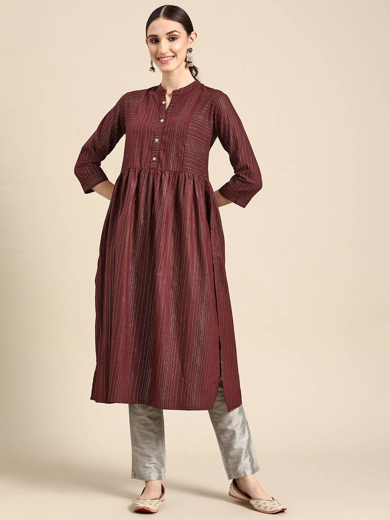 Mohvogue Women's Maroon Woven Design Cotton Blend Kurta.