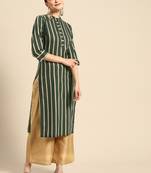 Mohvogue Women's Green Woven Design Cotton Blend Kurta.