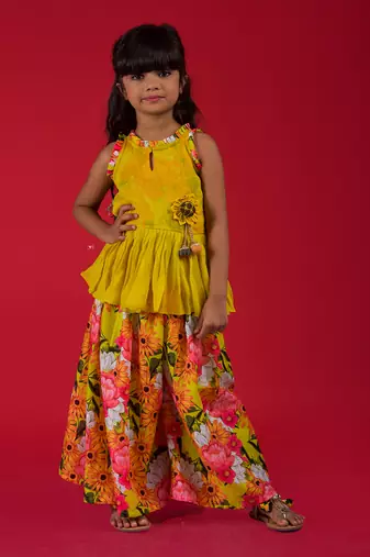 Peplum top with back tie ups and floral print palazzo