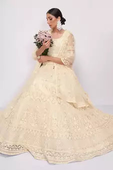 Off White Net Heavy Stone Embroidery Bridal Lehengas