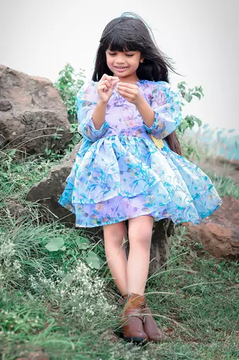 Floral Printed frock with flower on waist.